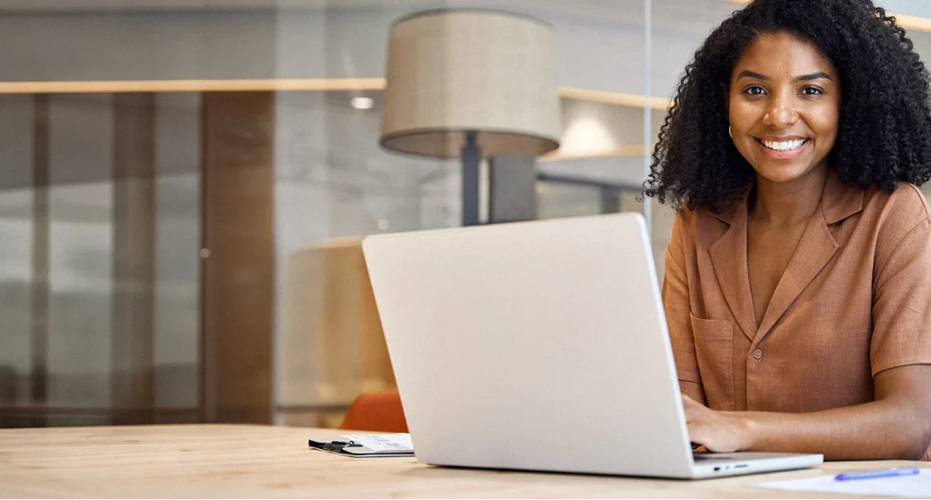 JAMPRO advisor at a laptop